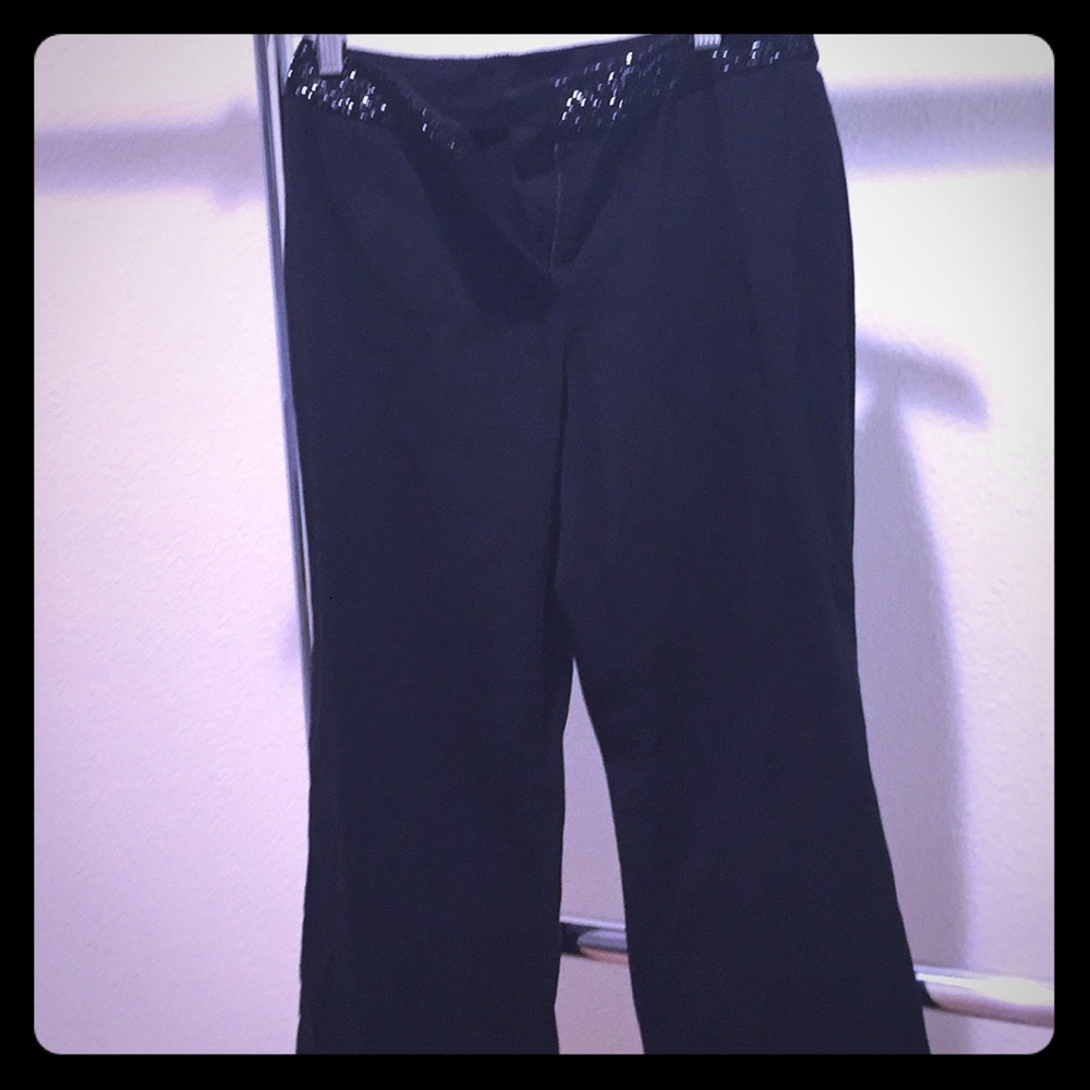 INC size 4 P. Great detail at waist. Boot cut.